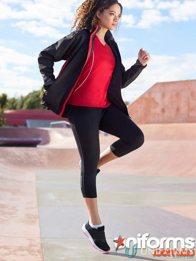 Woman wearing unisex Razor Jacket J408M from Biz Collection Unisex, athletic apparel