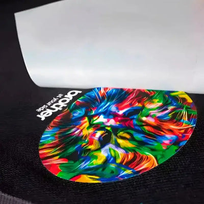 Vibrant multicolored abstract design sticker with swirling red blue green and yellow patterns for work uniforms