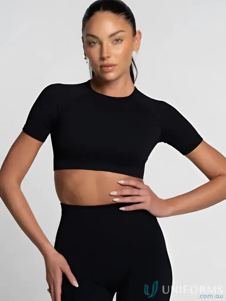 Black seamless cropped tee with high neckline and stretchy fabric perfect for comfortable workwear uniforms