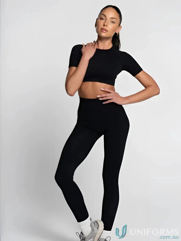 Black seamless cropped tee and high waisted leggings with a form fitting design perfect for workwear uniforms