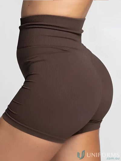 Brown high-waisted shorts with ribbed waistband and textured fabric.