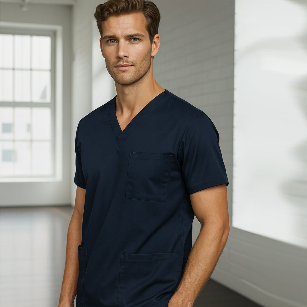 Navy blue BizCare Unisex Scrub Top with v-neck and chest pocket, comfortable classic scrub style