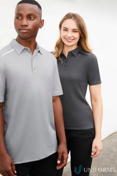 Two people wearing Sonar Polo shirts from BizCool Contrast Panels collection for reliable uniforms