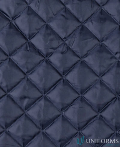 Navy blue quilted fabric on JB’s Southern Lands Jacket with adjustable sleeve openings