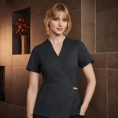Black short-sleeved Biz Collection womens spa tunic with v-neck wrap style