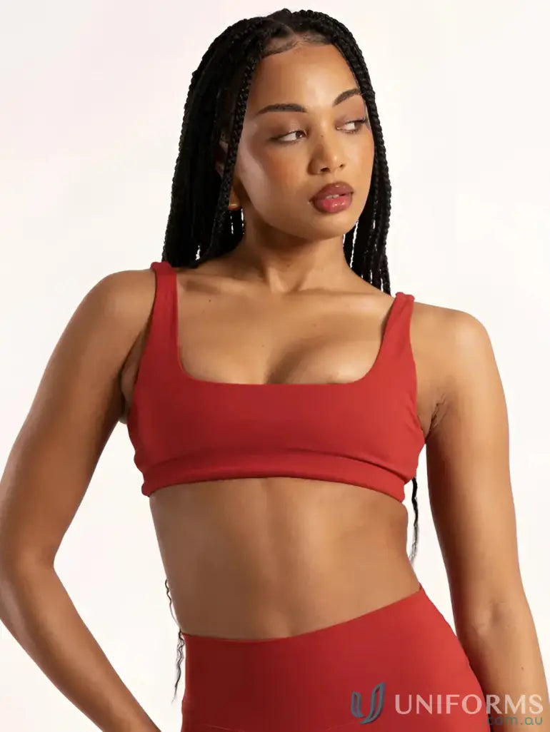 Red cropped sports bra with square neckline and thin straps perfect for comfortable work uniforms or active workwear