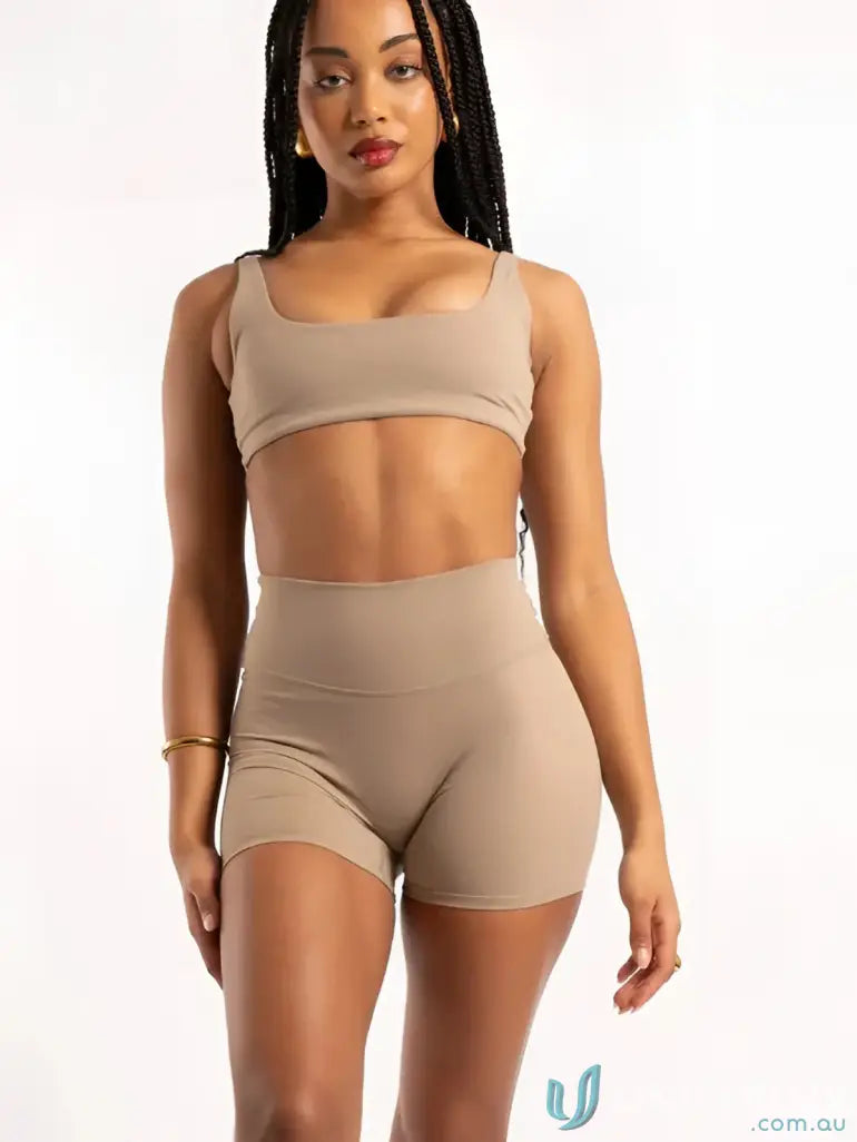 Beige ribbed high waisted shorts and matching crop top set perfect for comfortable workwear uniforms style