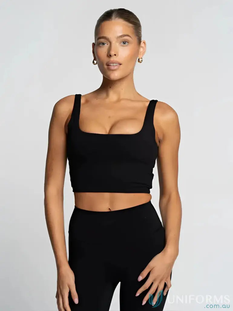 Black square neck crop top with thin straps in smooth fabric perfect for stylish work uniforms and workwear looks