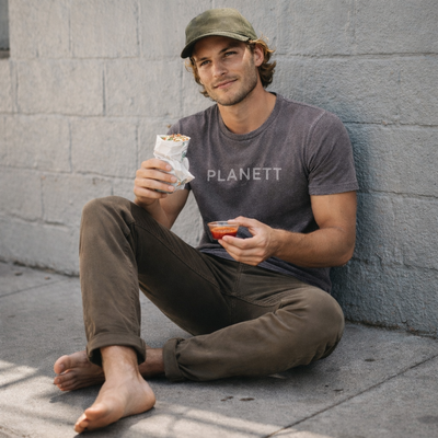 Gray t-shirt with ’planett’ printed in white letters.