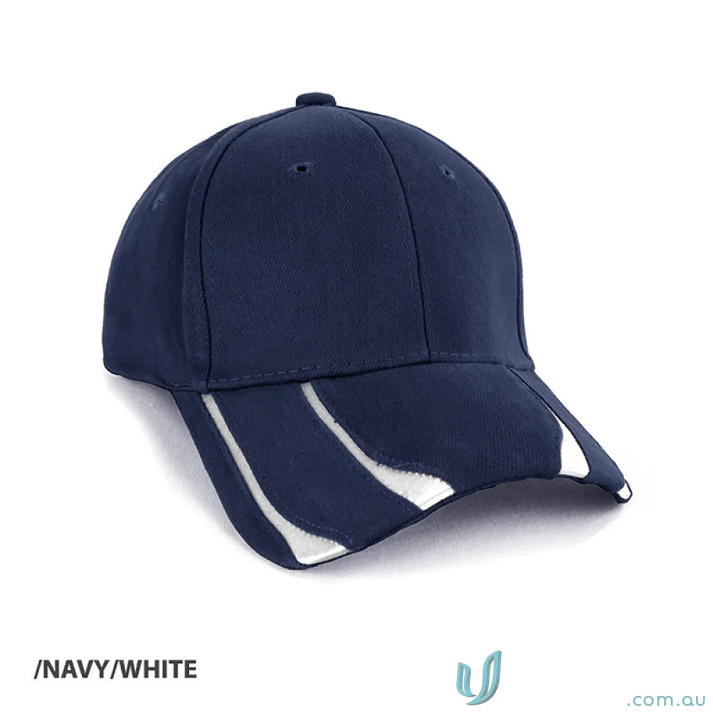 Striker Cap navy and white baseball cap paired with a black leather jacket and gold vintage necklace