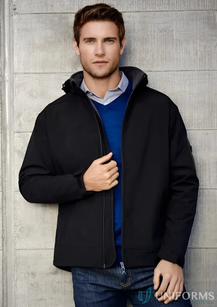 Man in black Summit Soft Shell Jacket from Biz Collection with waffle fleece lining