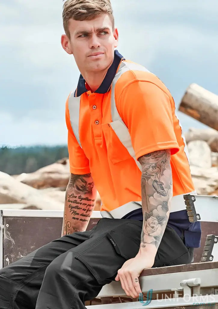 Man in Syzmic Hi Vis Spliced SS Polo with reflective shoulder tape for visibility