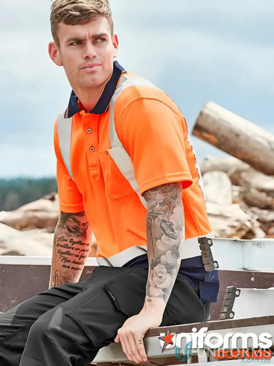 Man in orange vis spliced short sleeve polo with reflective shoulder tape and black work pants
