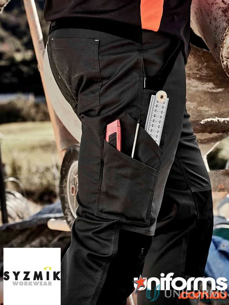 Black Syzmik Streetworx Tough Pant with tools in pocket showcasing durability meets ultimate style