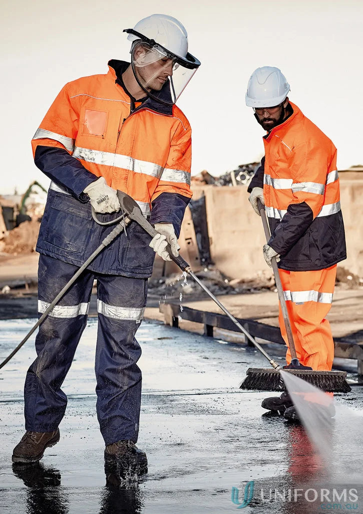 Workers cleaning outside wearing Syzmik Day/Night Quilt Lined Storm Jacket with chest pocket