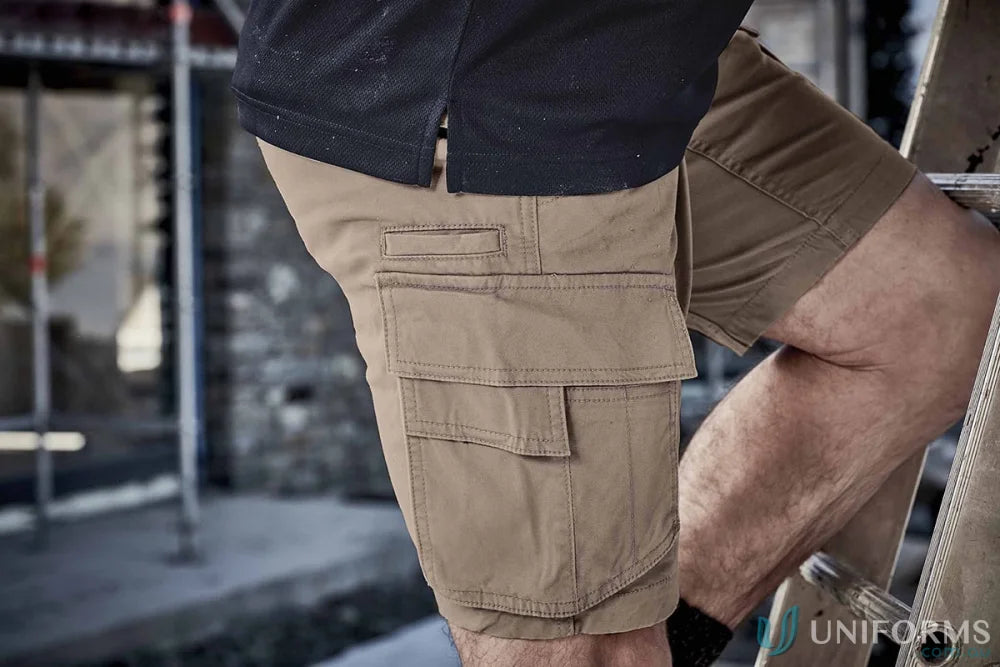 Khaki cargo shorts from SYZMIK Streetworx Curved Cargo collection with dedicated mobile phone pocket