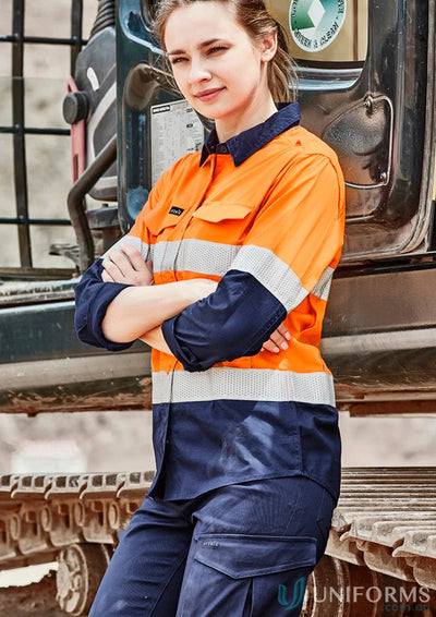 Woman in Syzmik womens rugged high-vis shirt zw720 with reflective tape for safety