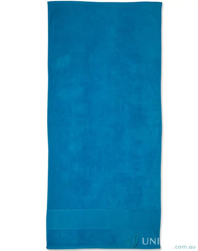 Blue terry velour beach towel perfect for your summer days at the beach