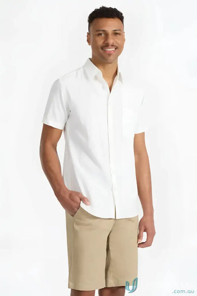 Man in white shirt and khaki Toby Chino Shorts for a casual look