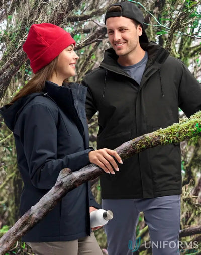 Two people in waterproof quilted jackets holding a water bottle and branch for stay dry workwear