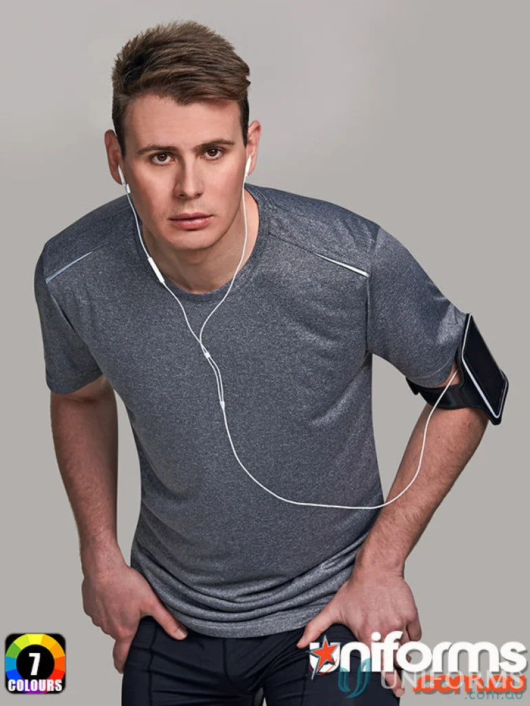 Male model in Winning Spirit Mens Harland Tee with rapid cool tech and wired earphones