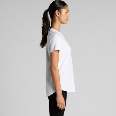 White oversized t-shirt with black leggings and ponytail.