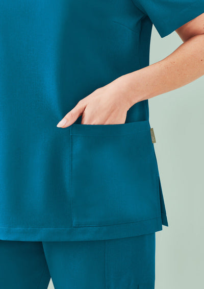 Teal Pulse V-Neck Scrub Top with front pocket, side slit, utility loop