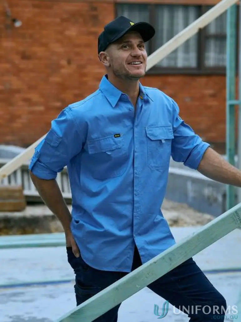 Man wearing bisley x airflow airflo ripstop shirt and black cap for staying cool