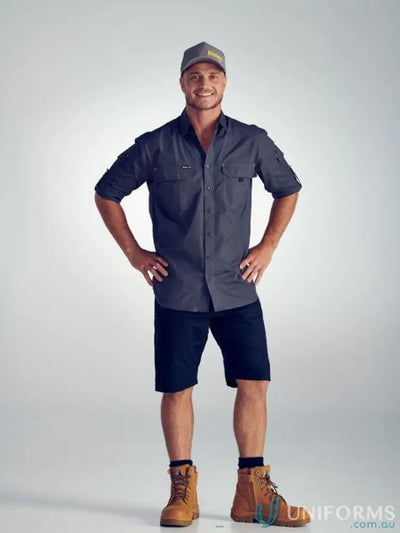 Man wearing grey Airflo Ripstop Shirt from Bisley X Airflow™ stays cool and stylish
