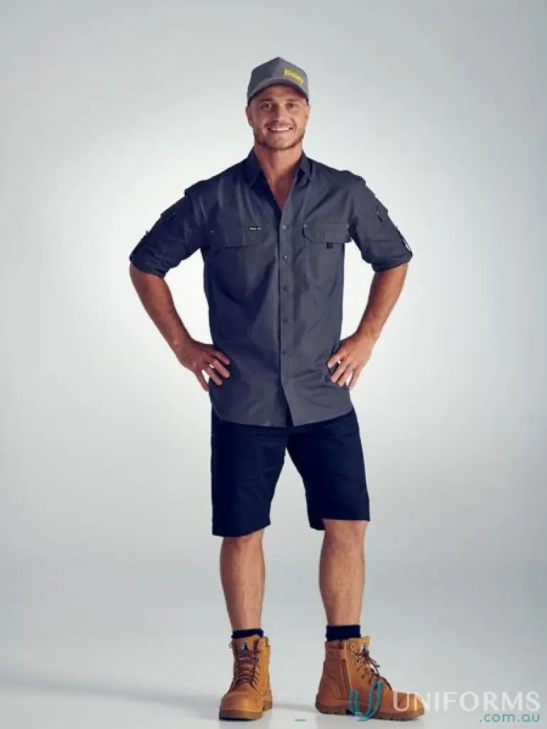 Man wearing grey Airflo Ripstop Shirt from Bisley X Airflow™ stays cool and stylish