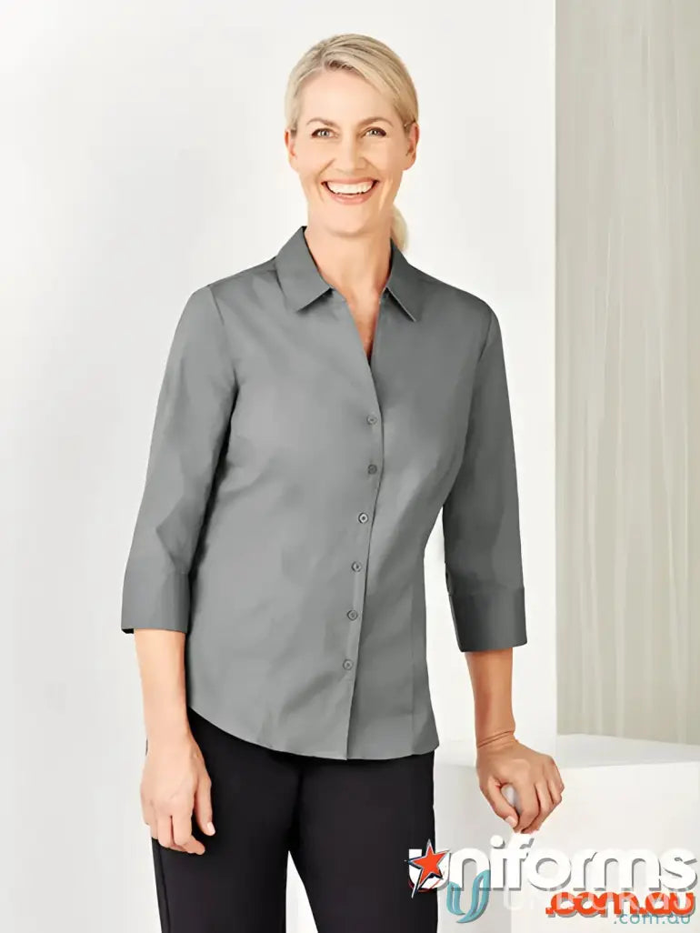 Woman wearing YR Ladies EMB 3Q Shirt in gray with french cuffs and cotton-rich blend